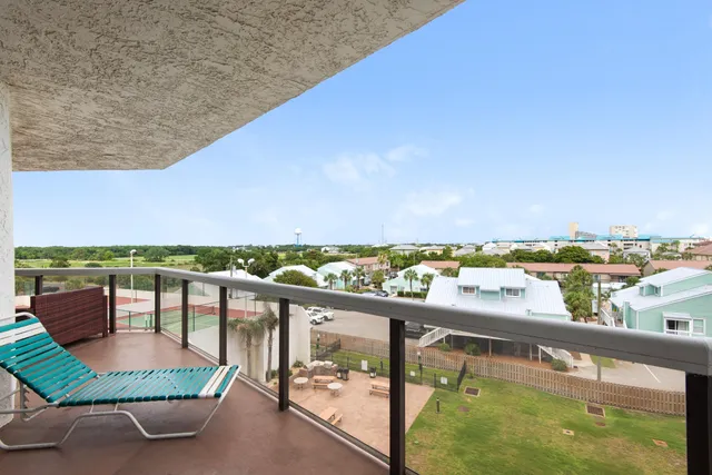 a view of a patio with furniture and stove