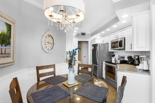 a view of bathroom with a washer and dryer