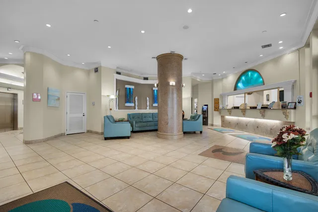 a view of a living room and entryway