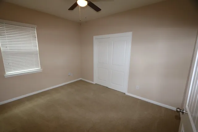 a bathroom with a sink mirror toilet and bathtub