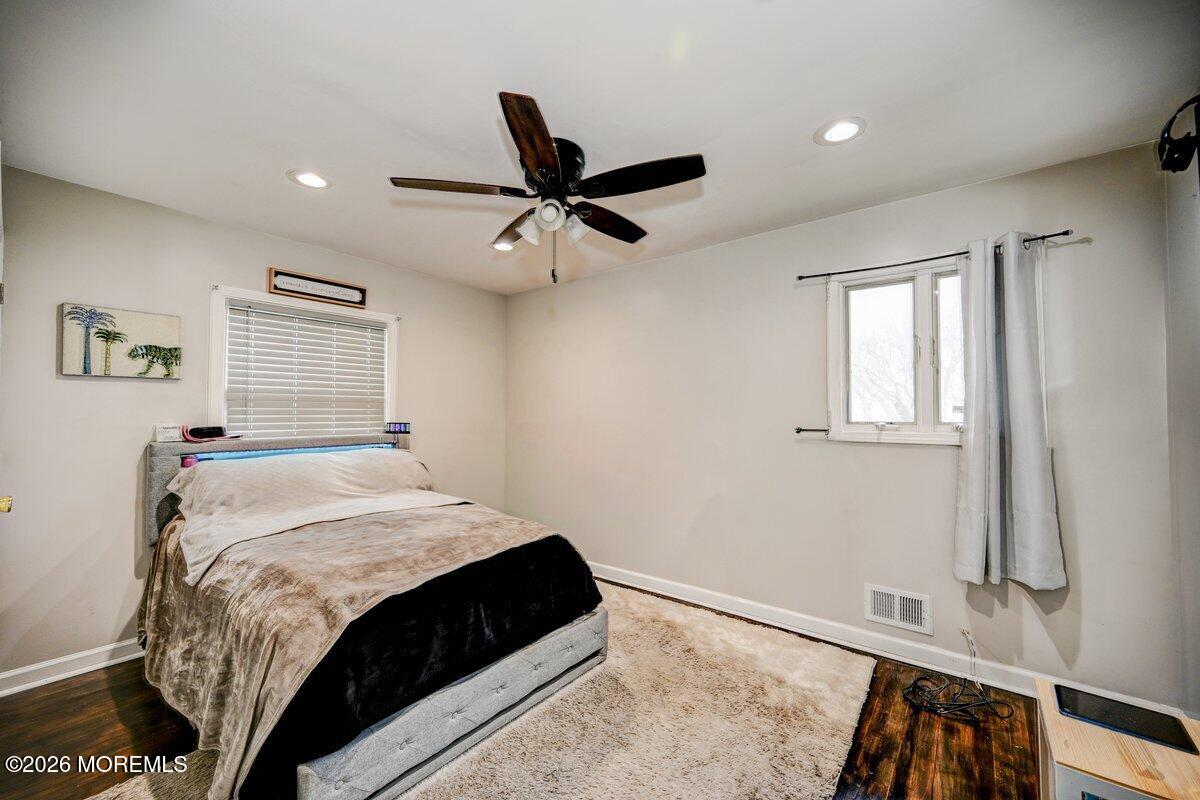 6 Meadowbrook Drive Howell, NJ 07731 - Photo 12 of 24 a bedroom with a bed and a window