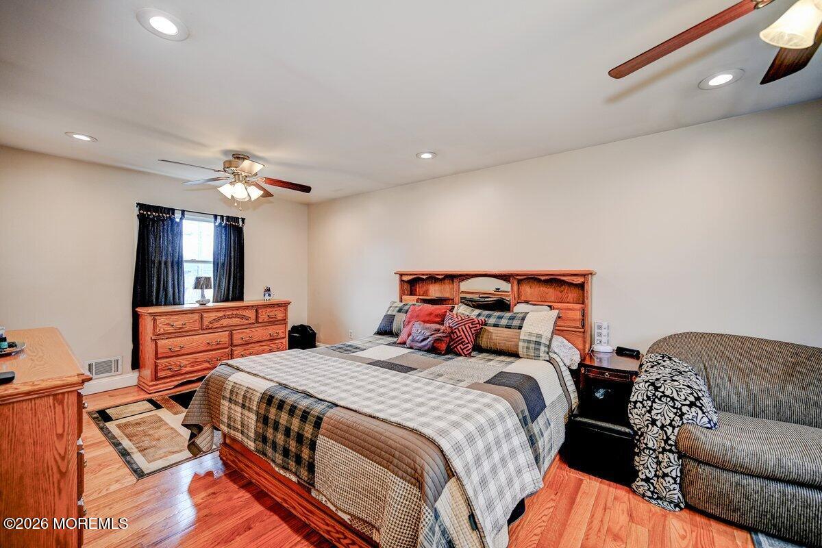 6 Meadowbrook Drive Howell, NJ 07731 - Photo 18 of 24 a bedroom with bed and window