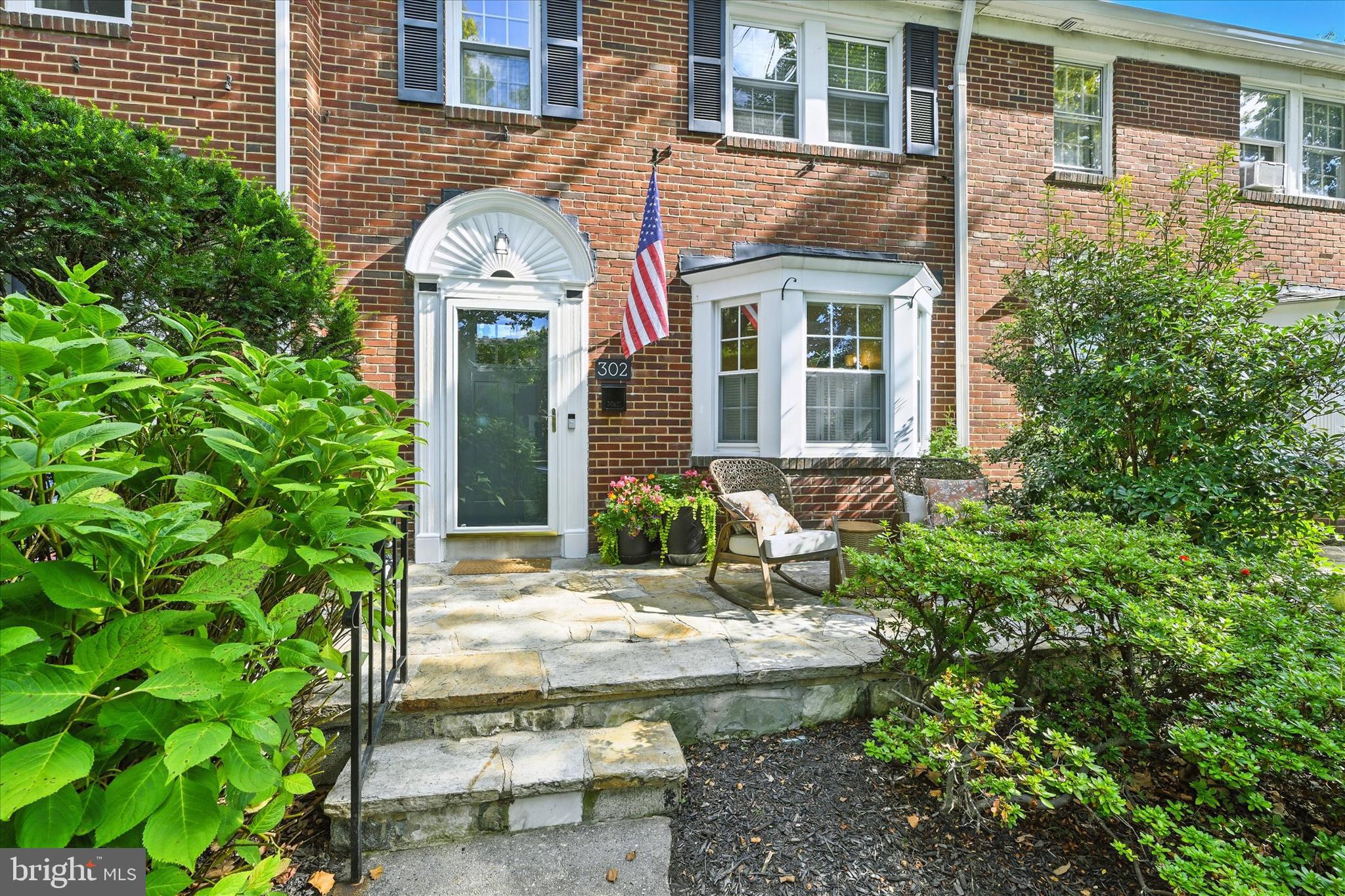 302 Murdock Road Baltimore, MD 21212 - Photo 3 of 32 a front view of a house with garden