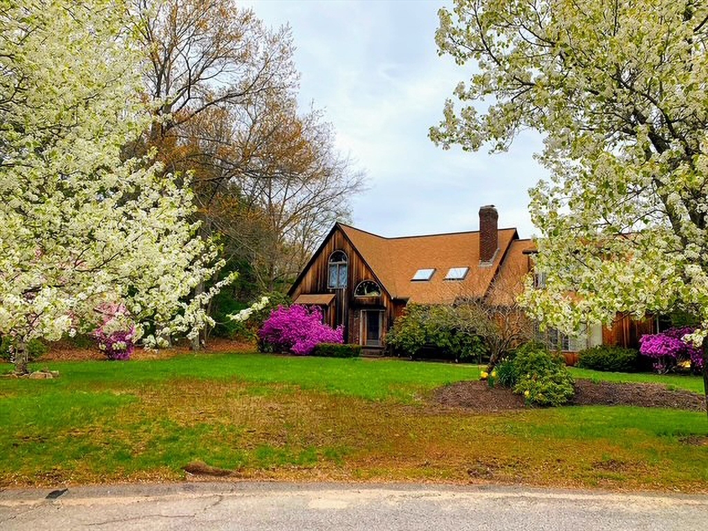 42 Pine Acres Road Foxboro, MA 02035 - Photo 1 of 40 a view of a house with a yard and sitting area