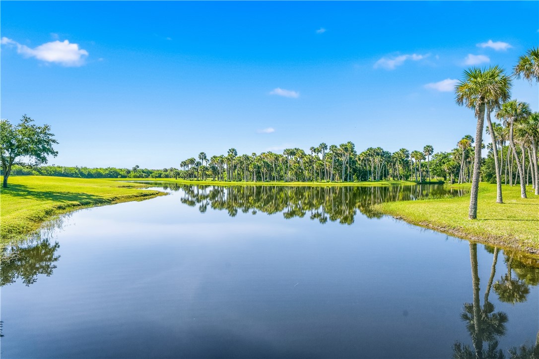 2350 Quay Dock Road Vero Beach, FL 32967 - Photo 7 of 35 a view of a lake with a big yard