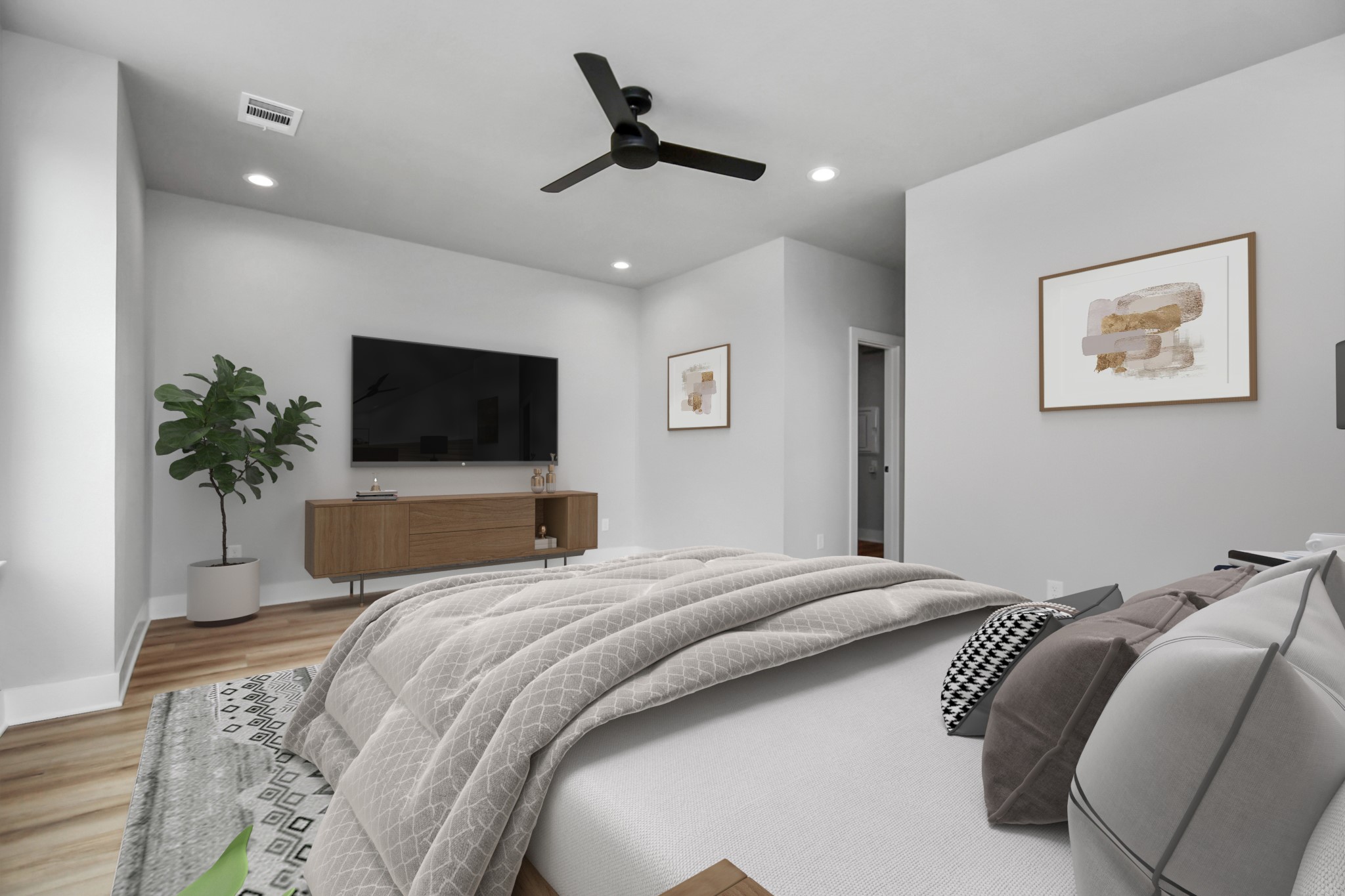 6817 Peerless Street Houston, TX 77021 - Photo 12 of 31 a bedroom with a bed and a flat screen tv