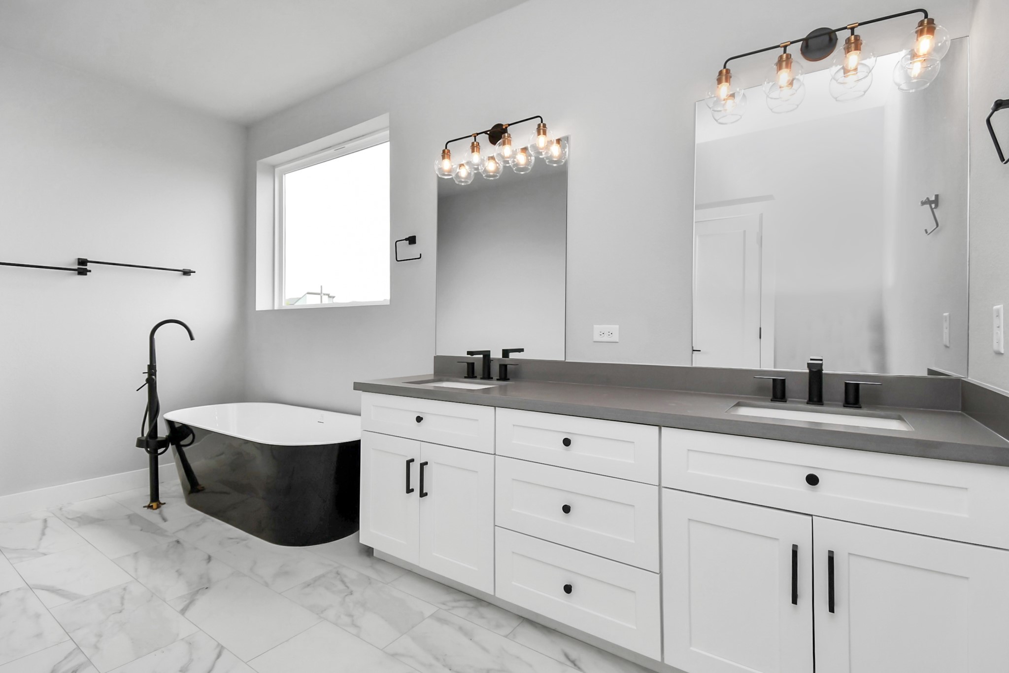 6817 Peerless Street Houston, TX 77021 - Photo 15 of 31 a spacious bathroom with a double vanity sink mirror and