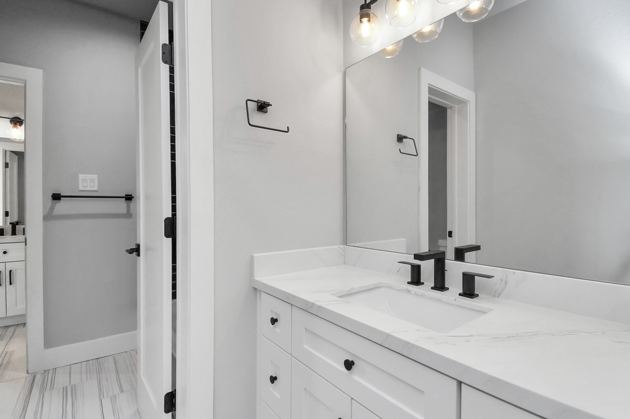 6817 Peerless Street Houston, TX 77021 - Photo 21 of 31 a bathroom with a sink vanity and a mirror