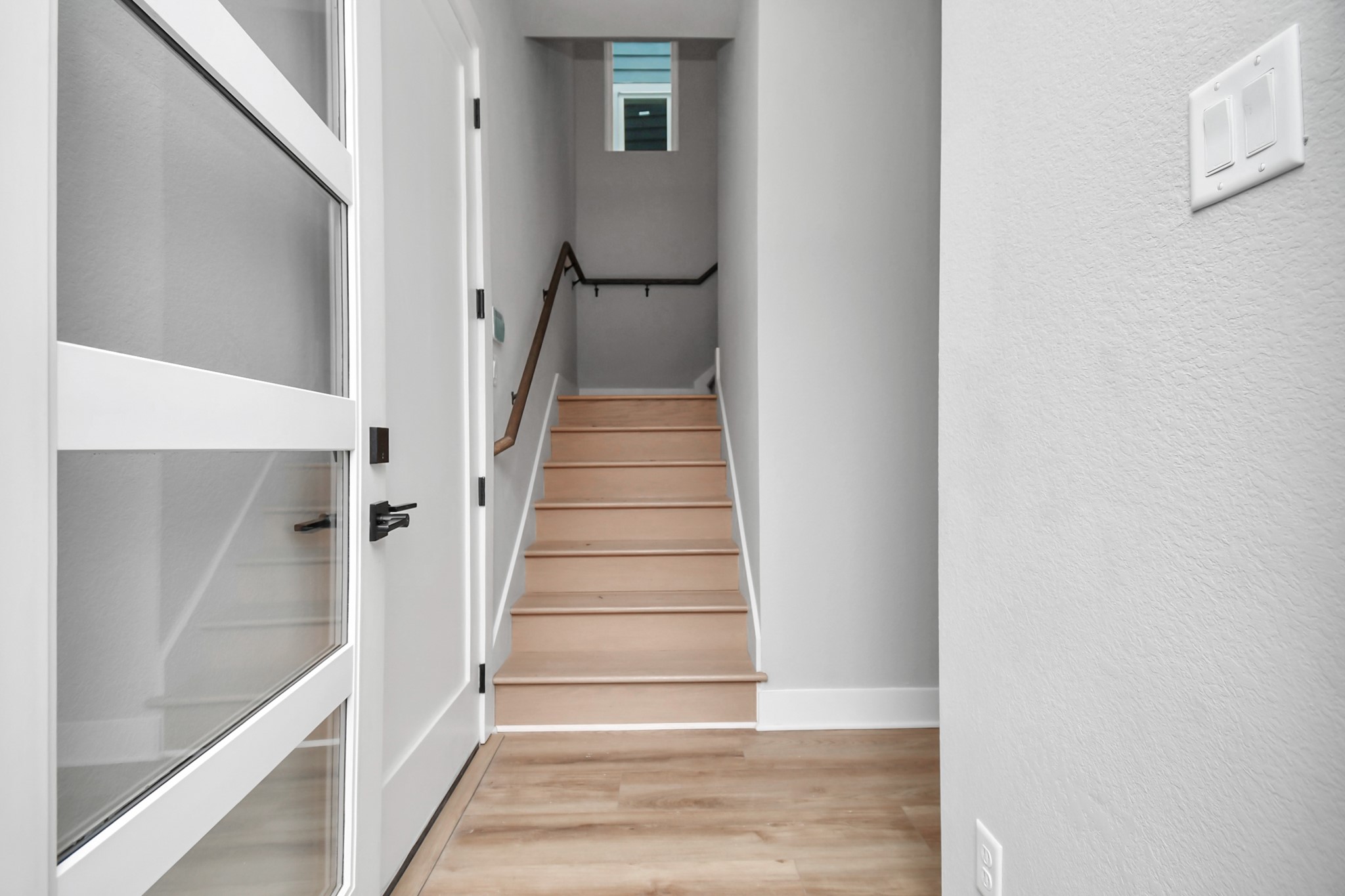6817 Peerless Street Houston, TX 77021 - Photo 28 of 31 a view of staircase with white walls and white door