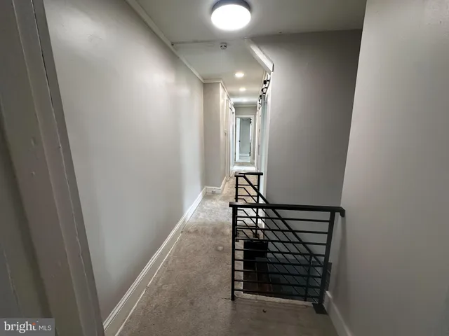 a bathroom with a sink a mirror and shower