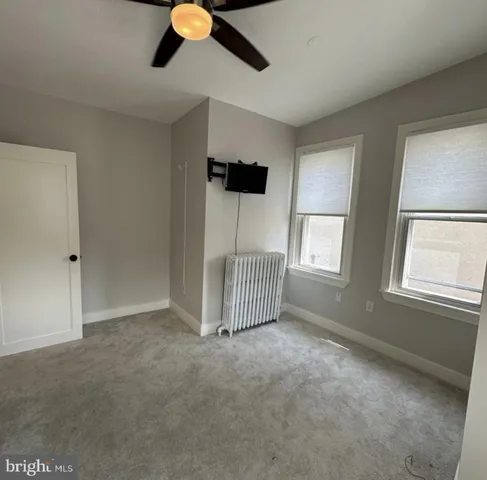 a view of a street with cars