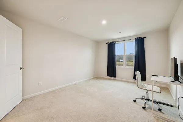 a view of workspace with livingroom