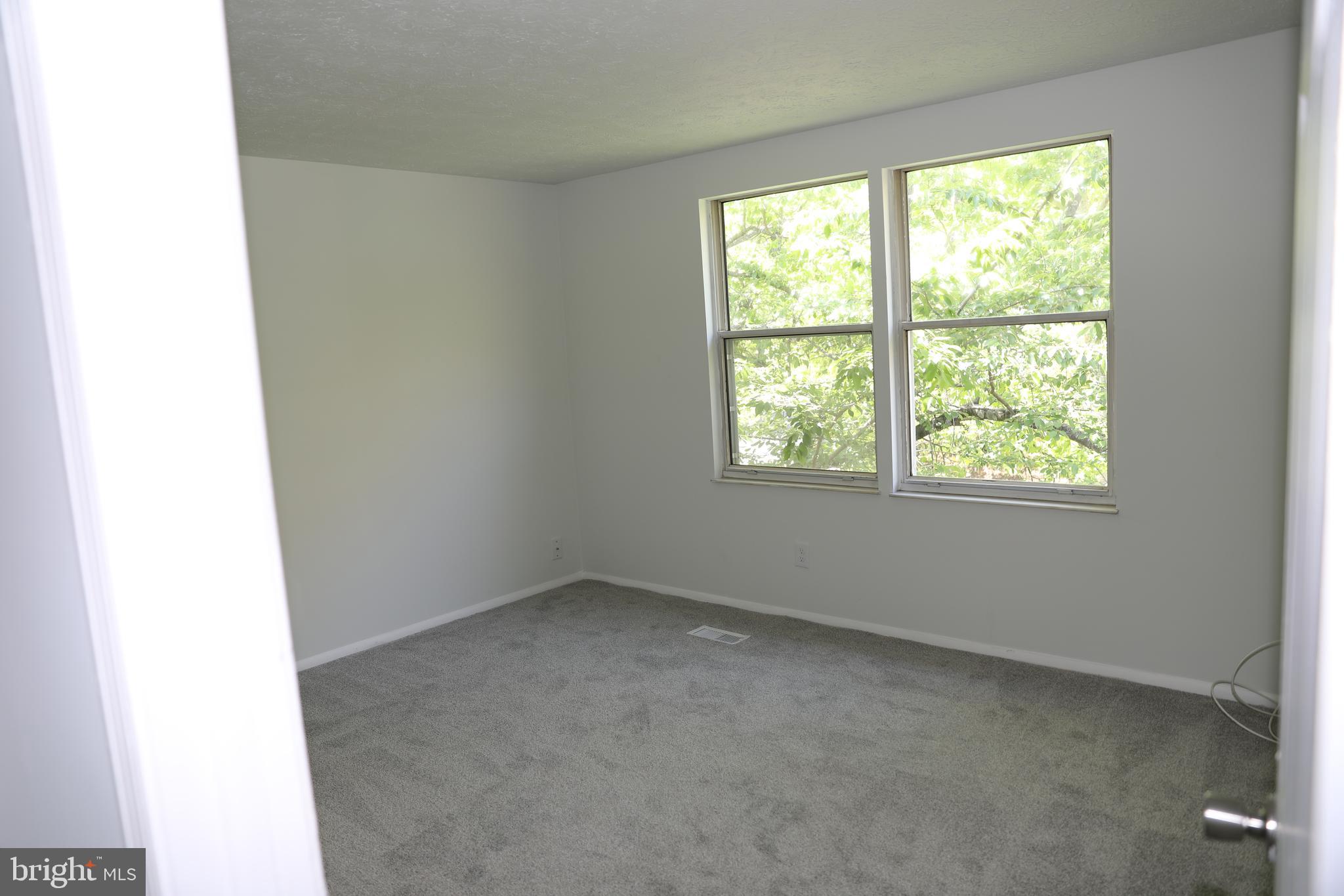 8106 Triple Crown Road Bowie, MD 20715 - Photo 17 of 21 an empty room with a window