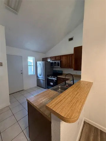 a room with furniture and window