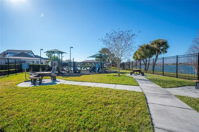 a view of a balcony with wooden floor and city view