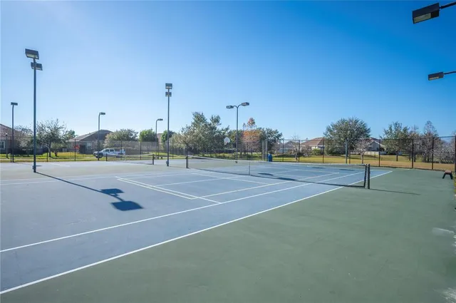 an aerial view of a house with outdoor space