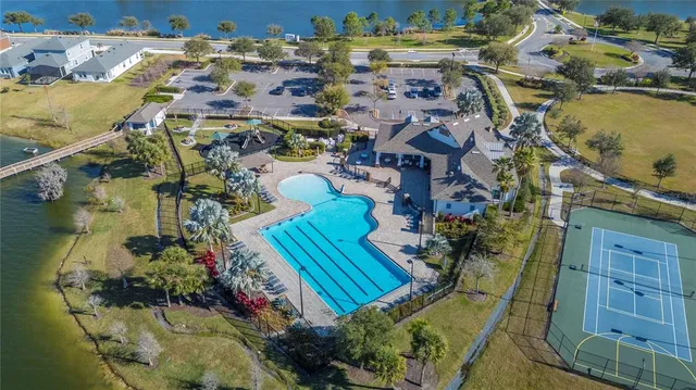 an aerial view of a houses with outdoor space