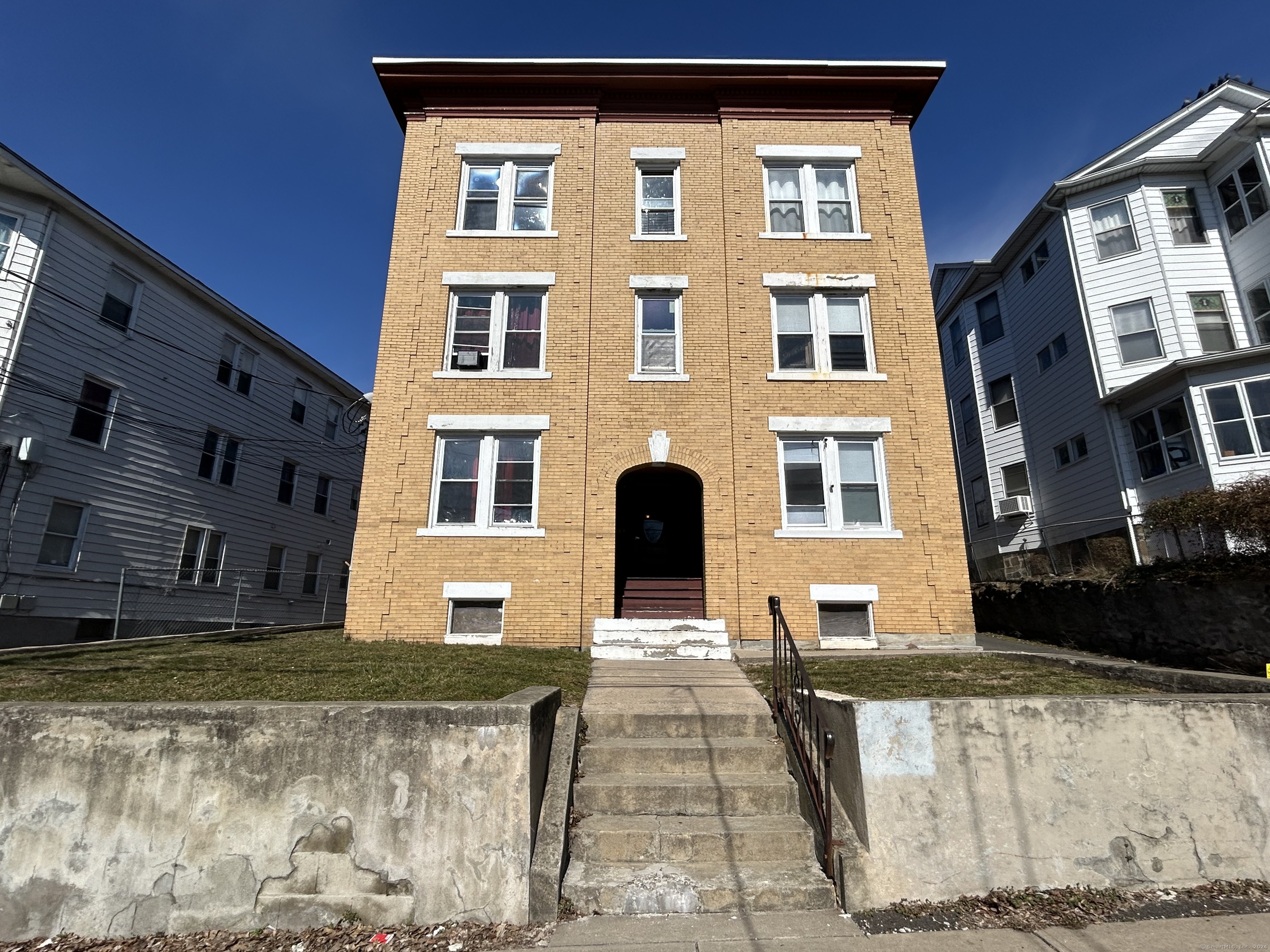 20 Beatty Street, Unit 3W New Britain, CT 06051 - Photo 12 of 15 a view of a building with many windows
