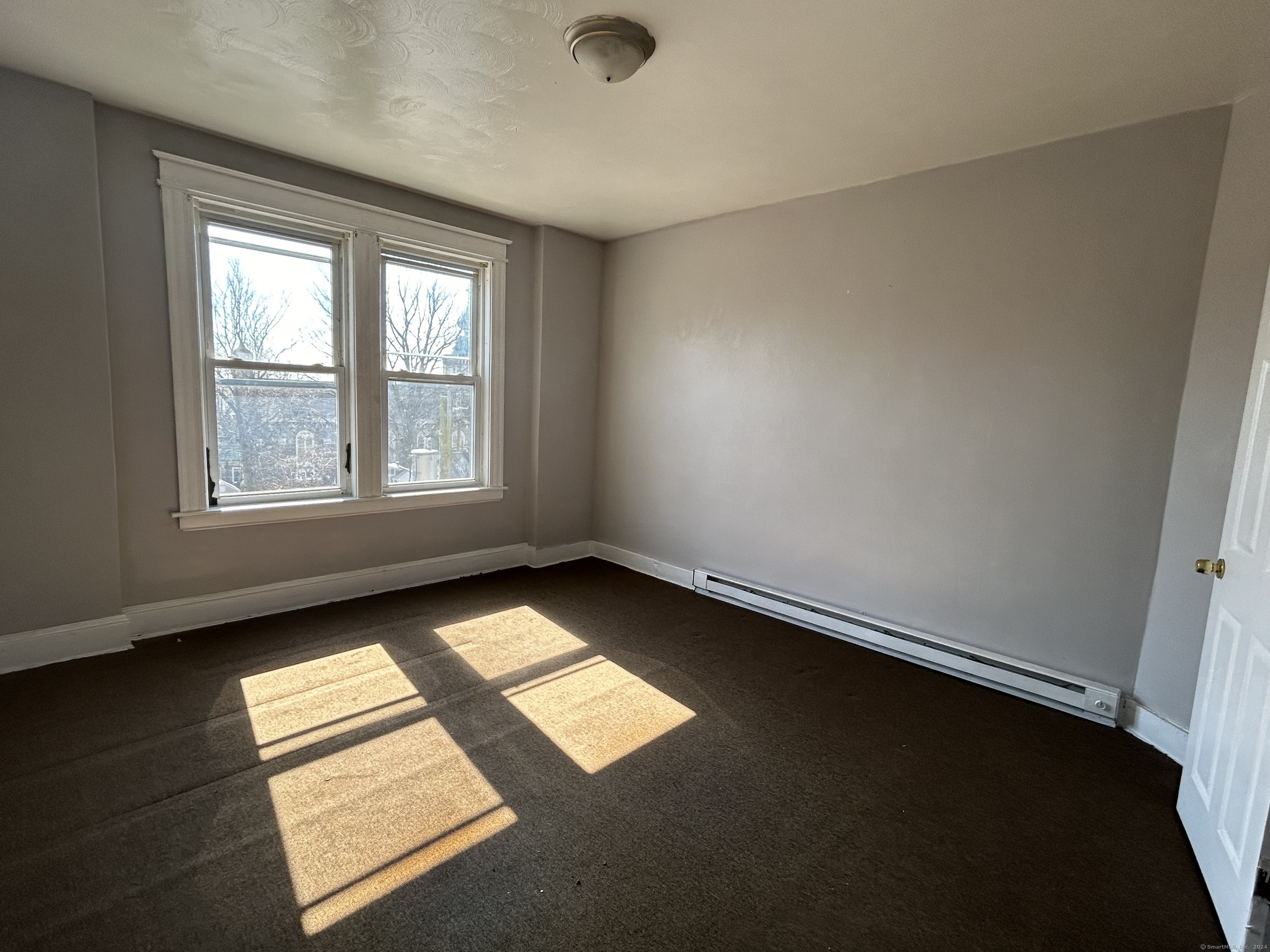 20 Beatty Street, Unit 3W New Britain, CT 06051 - Photo 15 of 15 an empty room with a window