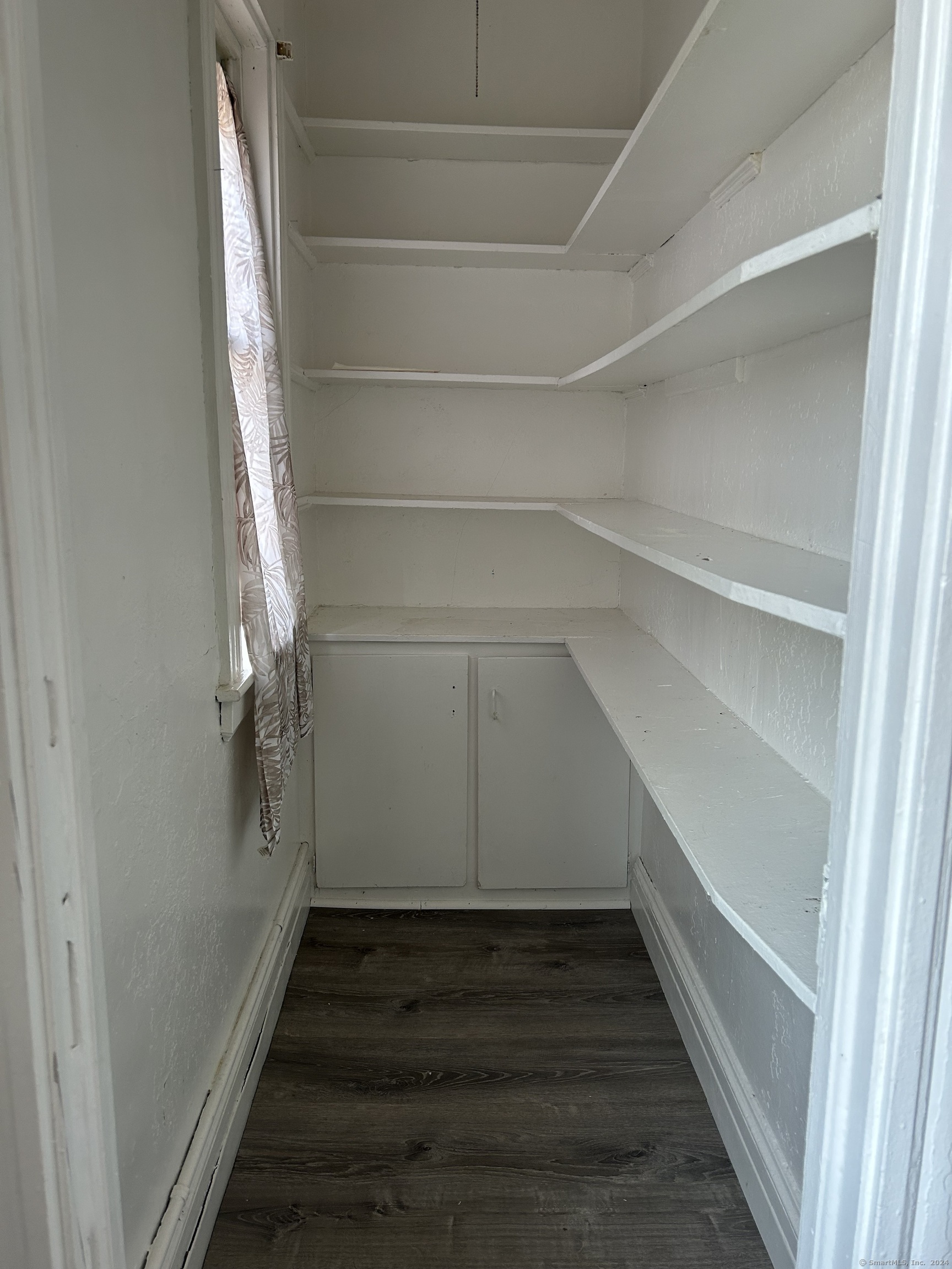 20 Beatty Street, Unit 3W New Britain, CT 06051 - Photo 4 of 15 a view of an empty walk in closet