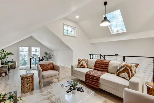 a living room with furniture and a couch