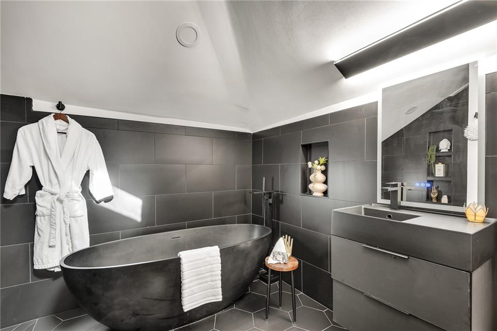 901 Argonne Avenue Northeast, Unit B Atlanta, GA 30309 - Photo 23 of 30 a living room with furniture