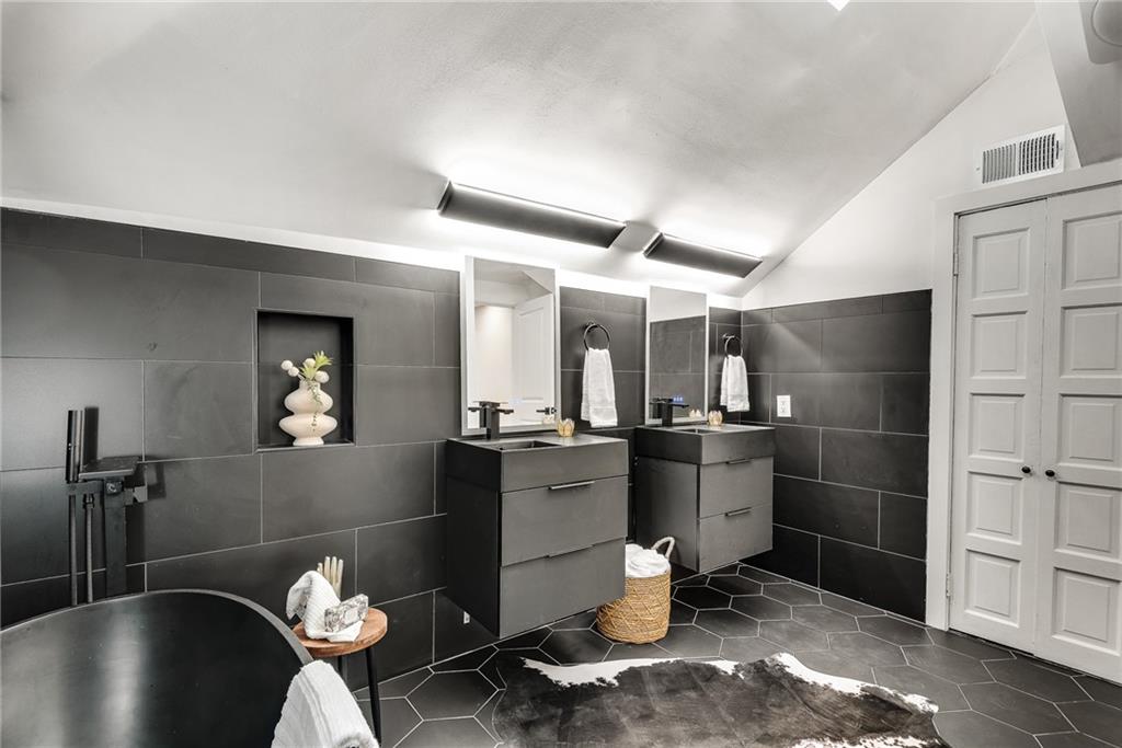 901 Argonne Avenue Northeast, Unit B Atlanta, GA 30309 - Photo 25 of 30 a kitchen with a sink and a stove top oven