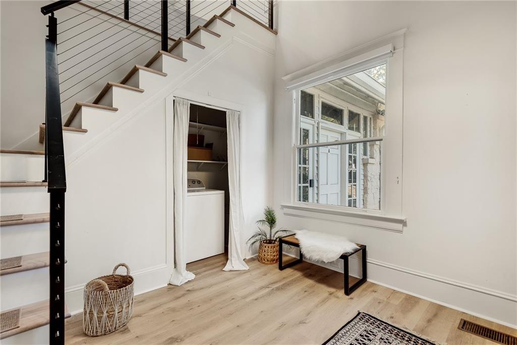 901 Argonne Avenue Northeast, Unit B Atlanta, GA 30309 - Photo 27 of 30 a view of a livingroom with furniture and a window
