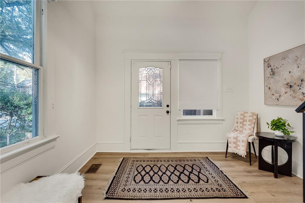 901 Argonne Avenue Northeast, Unit B Atlanta, GA 30309 - Photo 29 of 30 a bedroom with a bed and a window