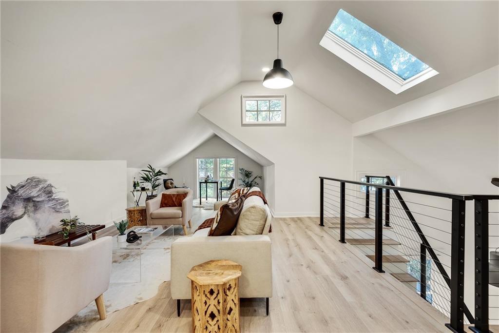 901 Argonne Avenue Northeast, Unit B Atlanta, GA 30309 - Photo 4 of 30 a living room with furniture