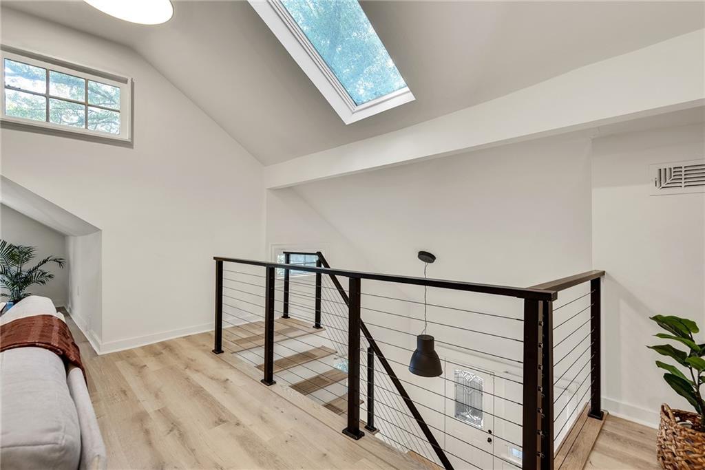 901 Argonne Avenue Northeast, Unit B Atlanta, GA 30309 - Photo 6 of 30 a view of entryway with a window and wooden floor