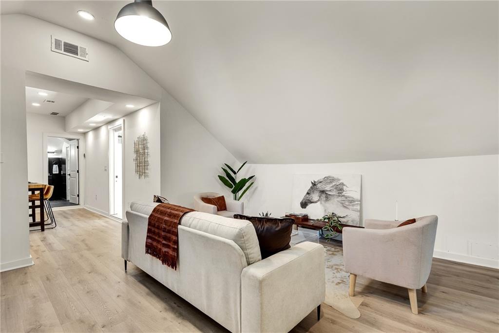 901 Argonne Avenue Northeast, Unit B Atlanta, GA 30309 - Photo 8 of 30 a living room with furniture