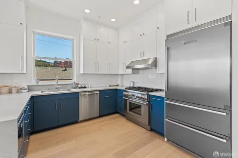 a white bath tub sitting in a bathroom