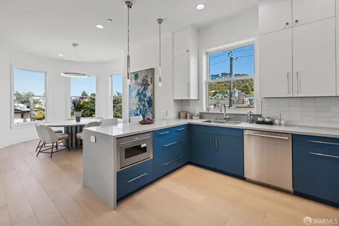 a bedroom with a bed and a lamp on table