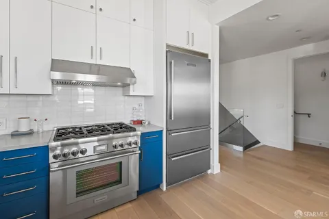 a view of a hallway with stairs