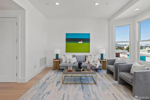 a kitchen with a stove top oven and refrigerator