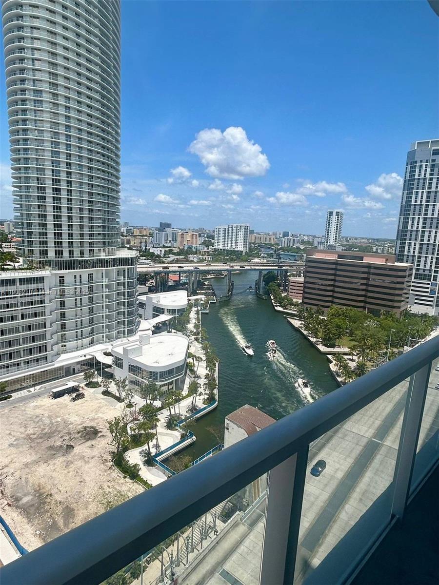 185 Southwest 7th Street, Unit 1802 Miami, FL 33130 - Photo 25 of 39 a view of a lake from a balcony