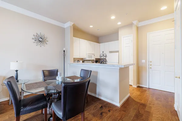 a view of a dining room with furniture