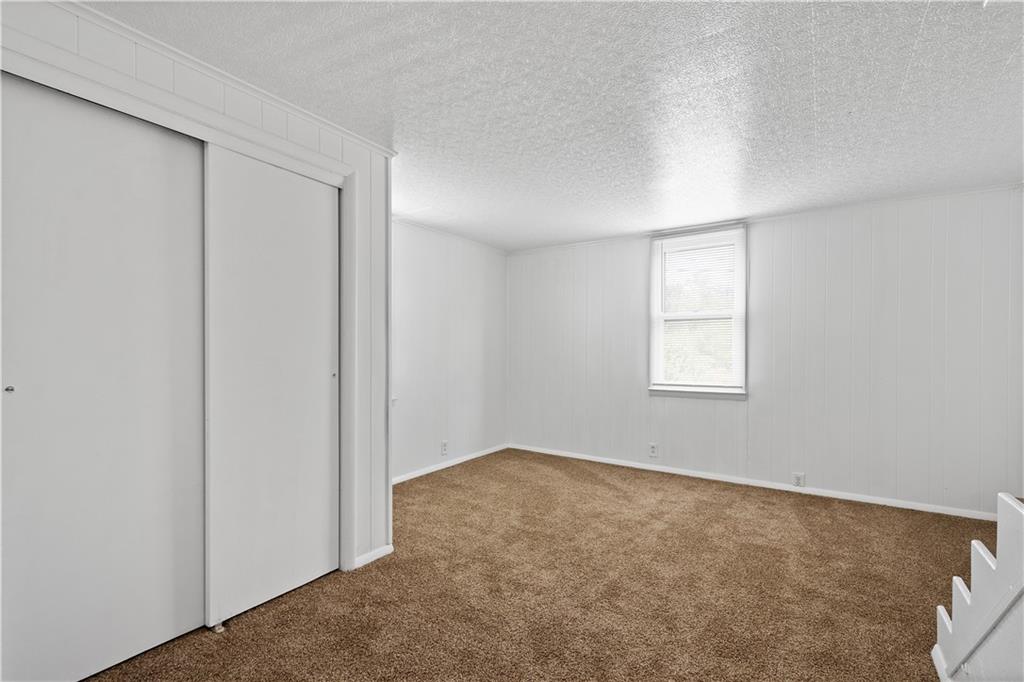 401 Upper Road Pittsburgh, PA 15228 - Photo 12 of 32 an empty room with windows