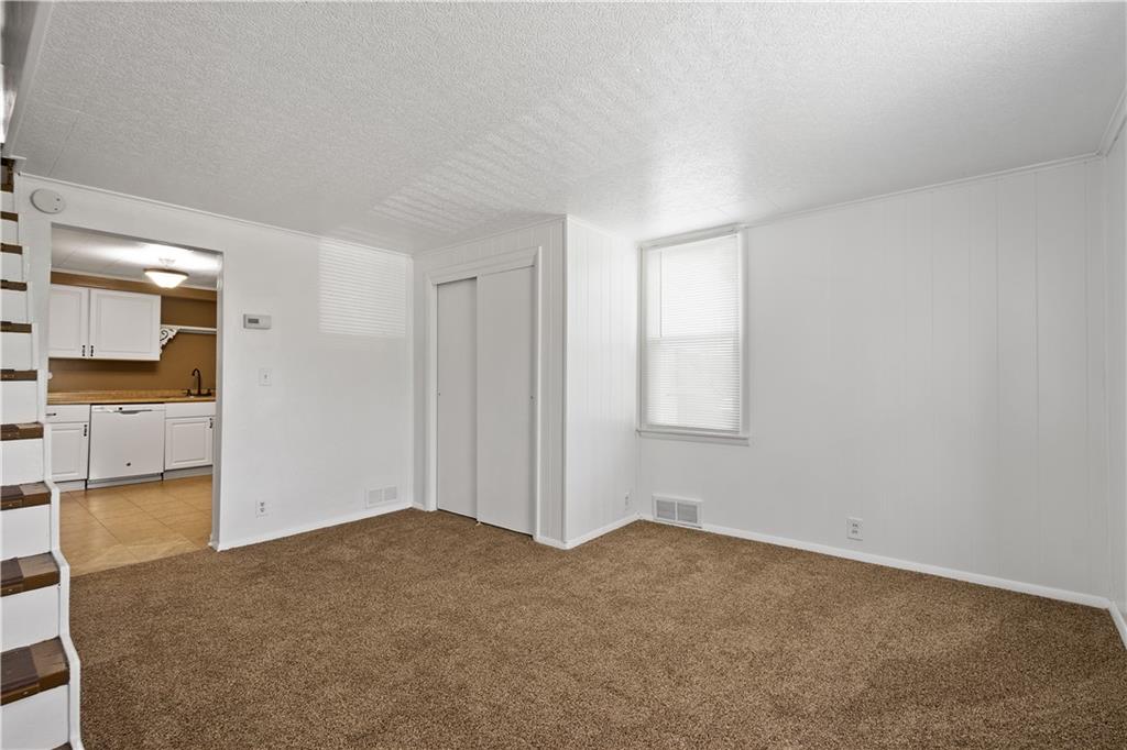 401 Upper Road Pittsburgh, PA 15228 - Photo 13 of 32 a view of a room with a empty space