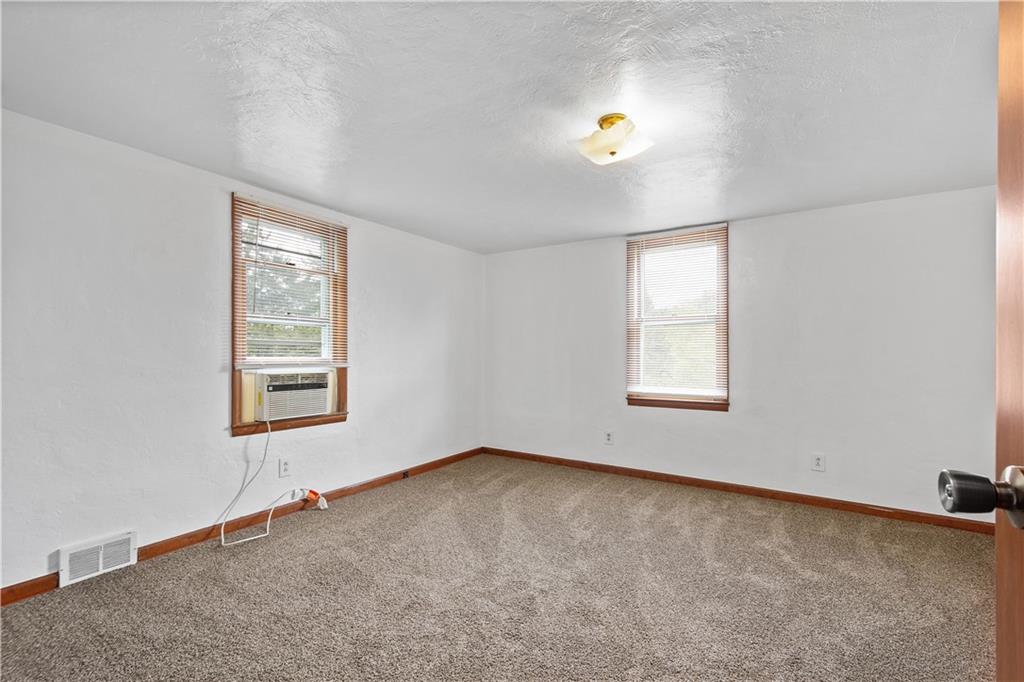 401 Upper Road Pittsburgh, PA 15228 - Photo 17 of 32 an empty room with a window