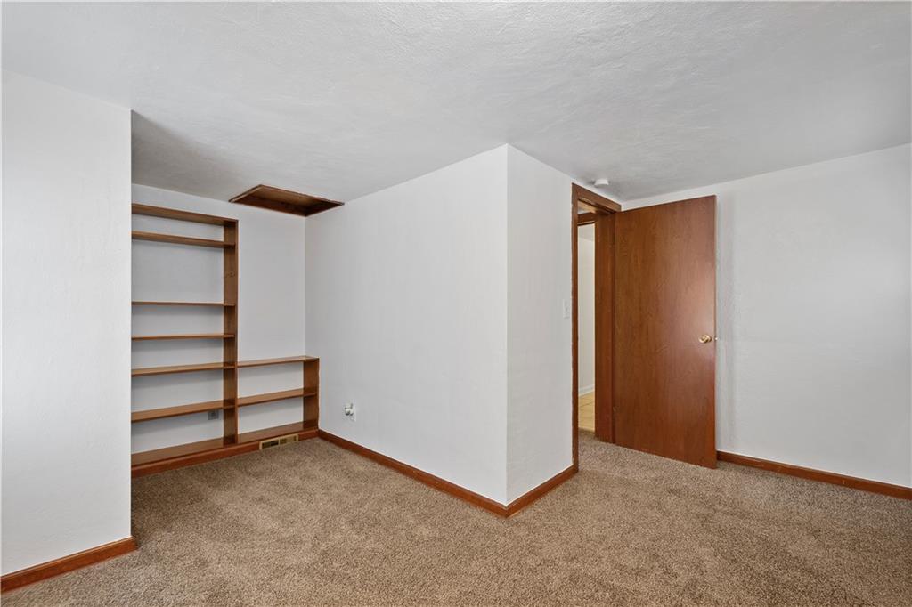 401 Upper Road Pittsburgh, PA 15228 - Photo 21 of 32 a view of an empty room with stairs