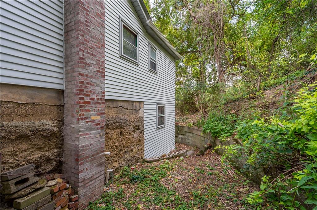 401 Upper Road Pittsburgh, PA 15228 - Photo 28 of 32 a view of a house with a yard