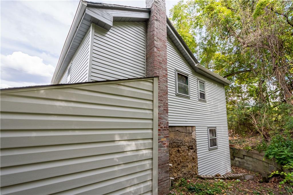 401 Upper Road Pittsburgh, PA 15228 - Photo 29 of 32 a view of a house with a window