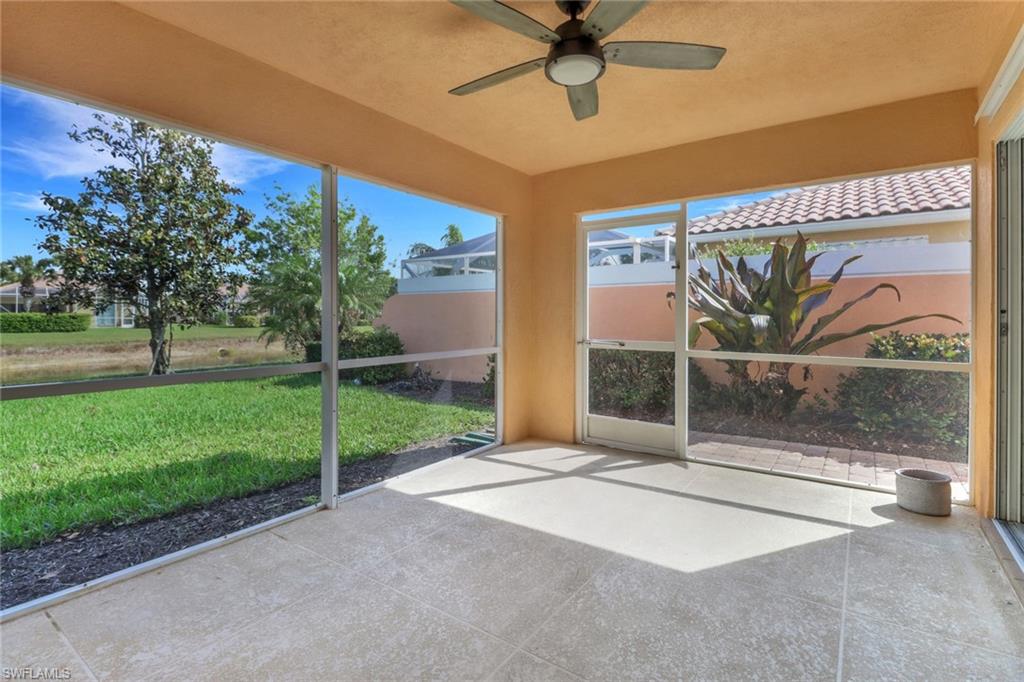 7933 Umberto Court Naples, FL 34114 - Photo 16 of 17 a view of a porch with a garden