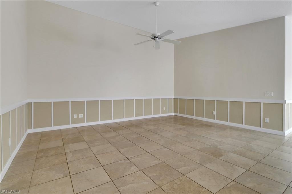 7933 Umberto Court Naples, FL 34114 - Photo 6 of 17 a view of an empty room with a window