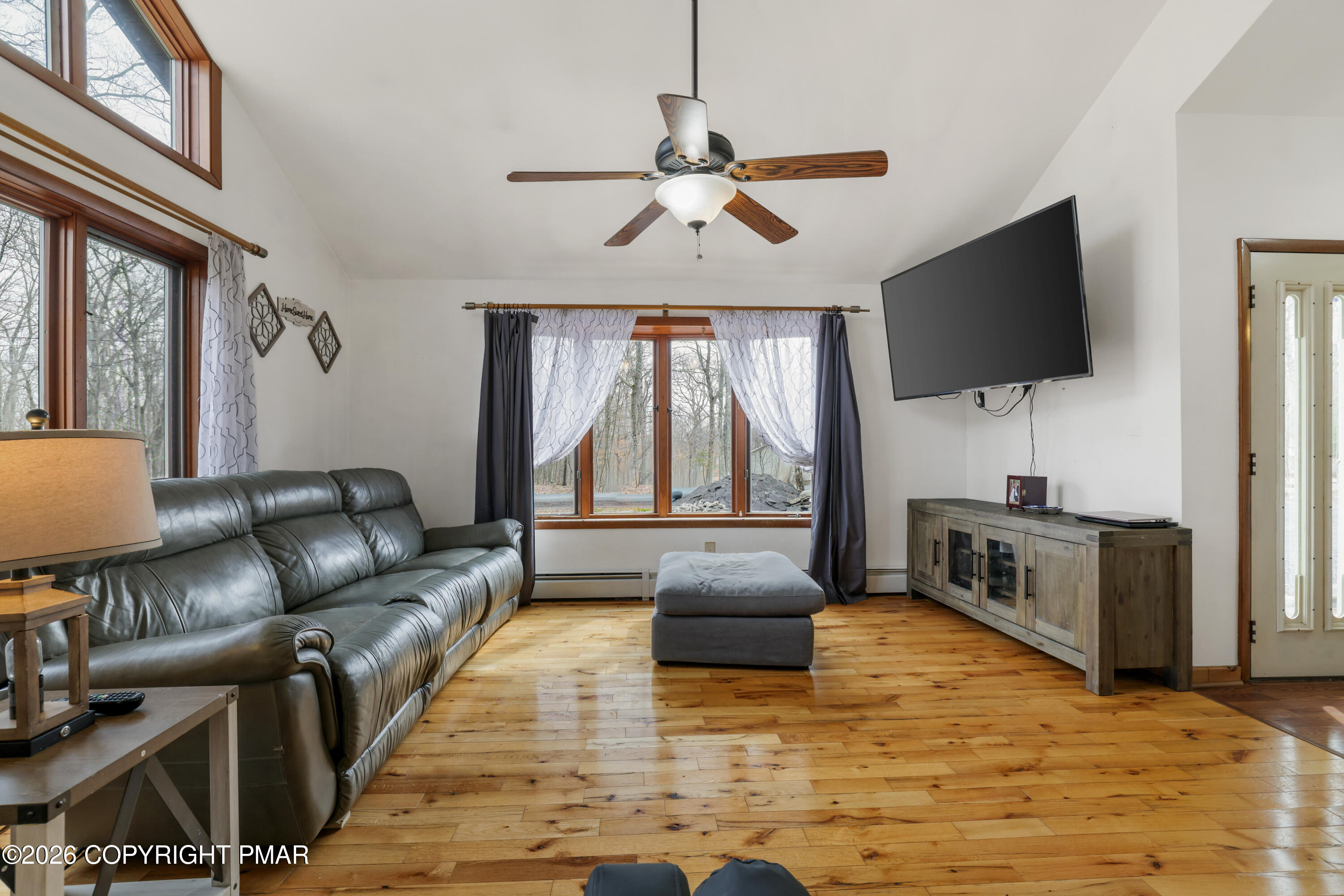 3638 Bristol Circle West East Stroudsburg, PA 18302 - Photo 12 of 62 a living room with furniture and a flat screen tv