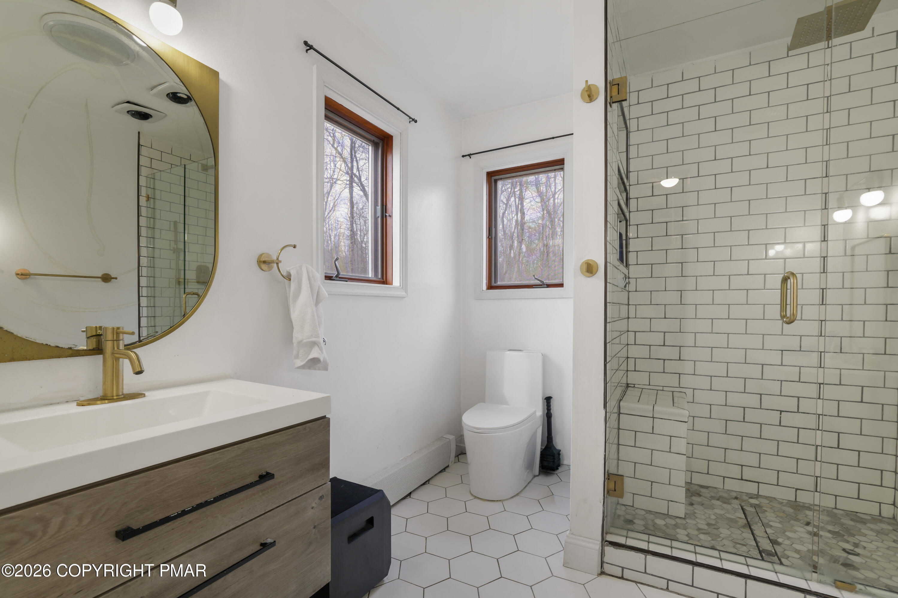 3638 Bristol Circle West East Stroudsburg, PA 18302 - Photo 27 of 62 a bathroom with a sink a toilet and mirror