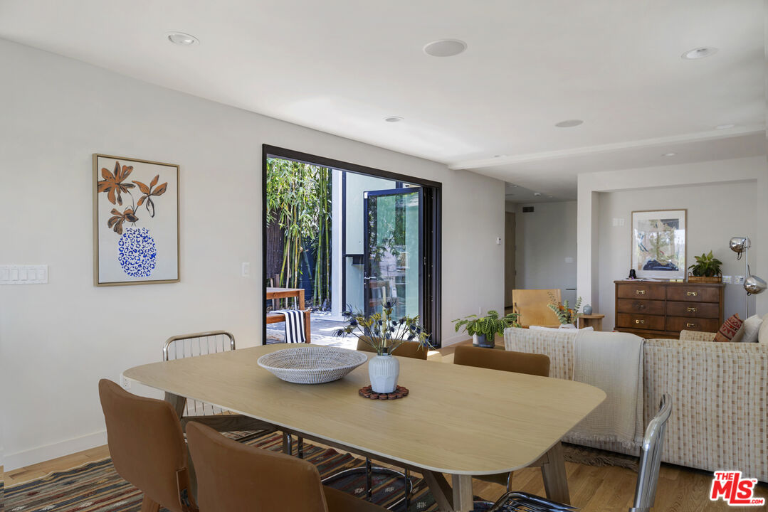 1508 Elevado Street Los Angeles, CA 90026 - Photo 15 of 50 a view of a dining room with furniture window and outside view