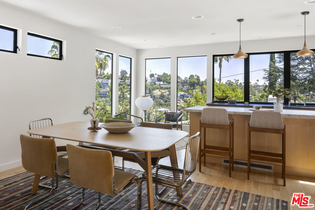 1508 Elevado Street Los Angeles, CA 90026 - Photo 17 of 50 a view of a dining room with furniture window and outside view